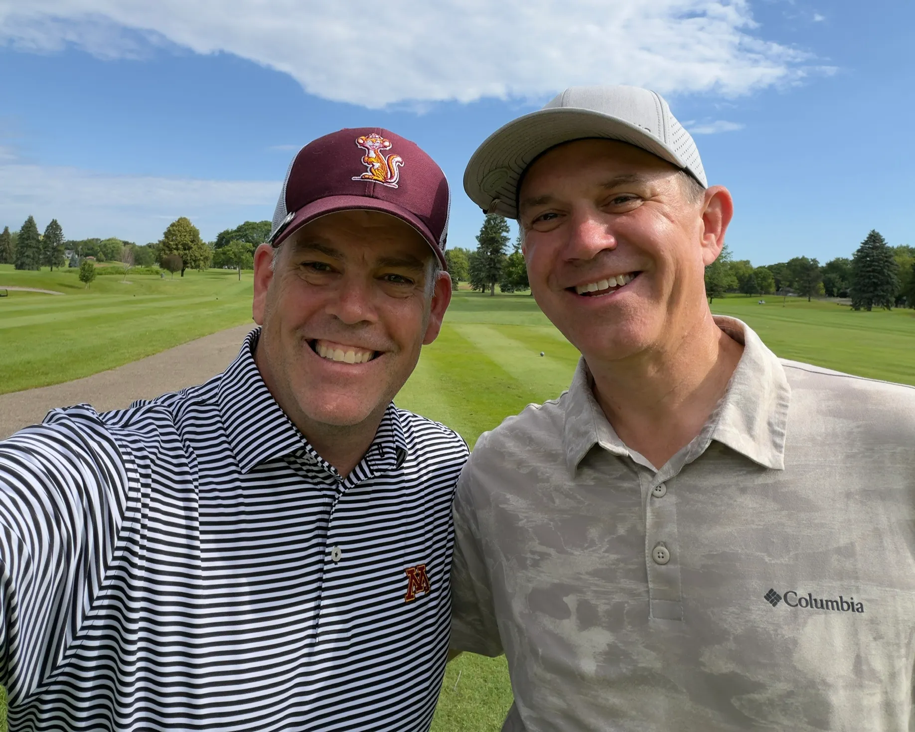 Two golfers on the course